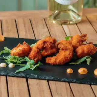 Langostinos con crocante al pistacho