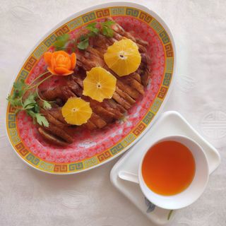 30. Pato con naranja