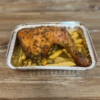 Muslo de pollo al horno con patatas.