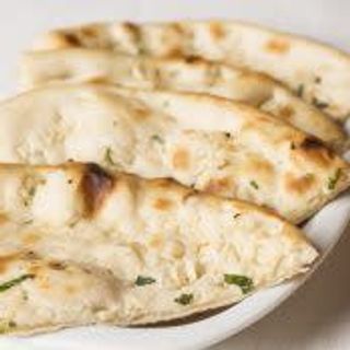 97. Garlic Naan ( contiene gluten)