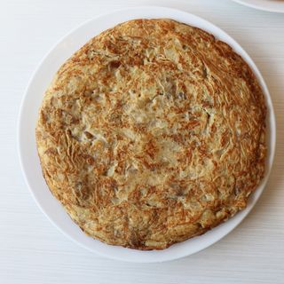 Tortilla De Boletus Y Cebolla Caramelizada