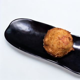 Palla di riso mortadella e pesto di pistacchio