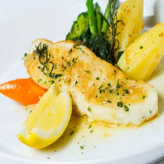 Grilled Fish In Garlic Butter Sauce