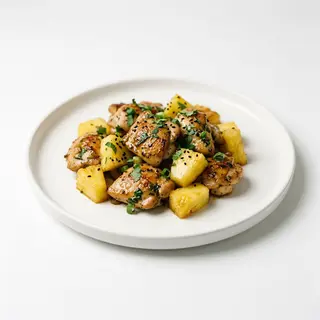 Pollo saltato con ananas