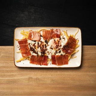 Huevos rotos con jamón