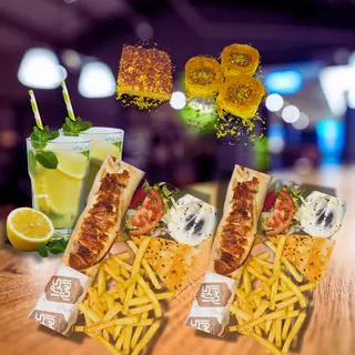 2 Sandwich Shawarma (Poulet+ Viande )+ 2 Desserts & Limonade Libanaise