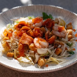 King Caesar salad with shrimps,salmon and red caviar