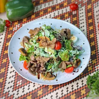 Теплый салат с кониной