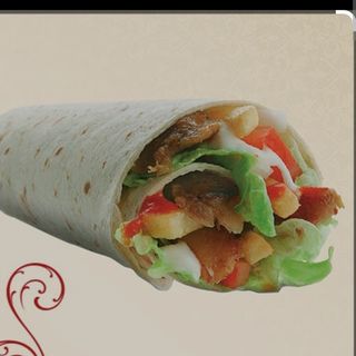 12. Rollo Kebab mediano(dentro del rollo carne Patatas y ensalada)