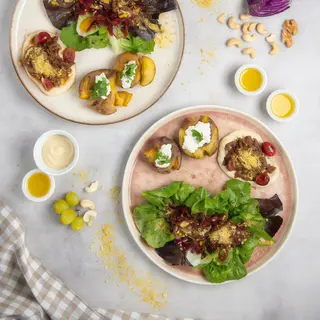 Shawarma de setas con ricotta, papa rota trufada y ensalada