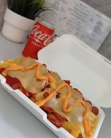 Ración De Salchipapa