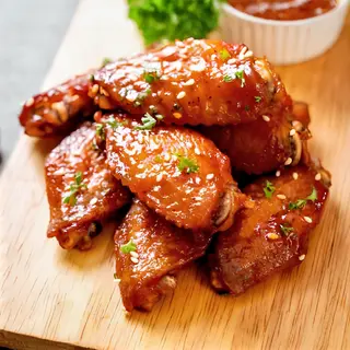 Alitas De Pollo Bañadas En Salsa Barbacoa