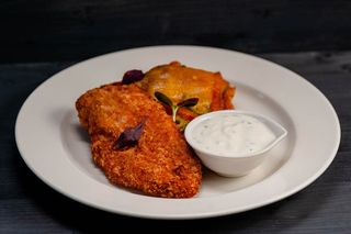 Chicken schnitzel in Grana padano crust