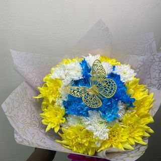Sunny Serenity: A Bouquet of Blue, White, and Yellow Mums