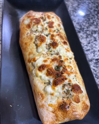 Rollo gratinado solo carne.(con queso fundido al horno)