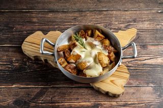 Patate al forno con caciocavallo fuso