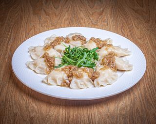 Pierogi gotowane z kapustą i grzybami 10szt