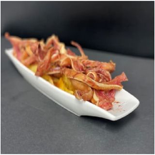 Oreja Frita Con Patatas Y Pimenton