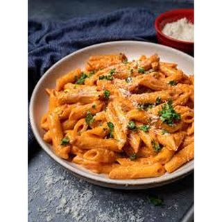 Spaghetti In Creamy Pink Sauce With Cheese