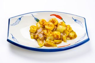 135 Gamberi con salsa curry