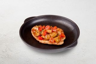 Стейк зі свинини з овочами