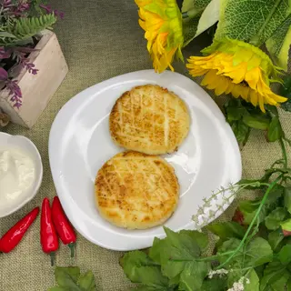 Сырники со сметаной (2 шт.)
