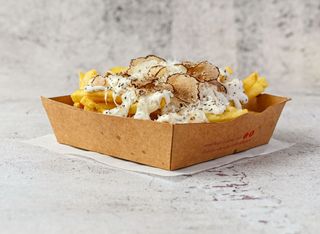 Porzione di patatine rustiche al tartufo