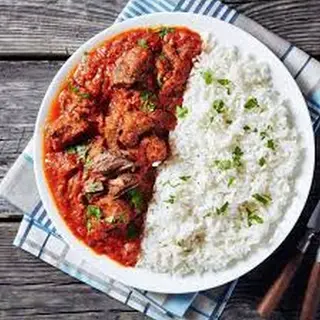 White Rice & Stew (with Turkey, Chicken, Goat, or Beef)