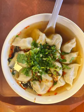 39 Sopa De Empanadillas de cerdo