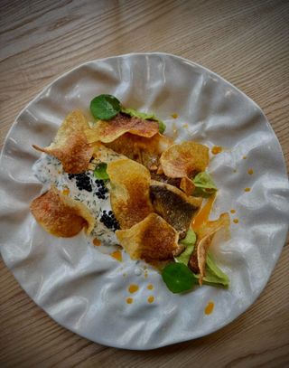 Філе сібаса з пюре зеленого горошку