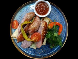 Смажені свинні ковбаски