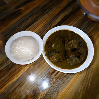 Pounded Yam with Preferred Soup and Smoked Catfish