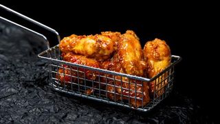 ფრთა ტკბილ ცხარე სოუსით 16 ცალი