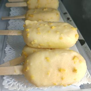 Mini stecco Mango (copertura cioccolato crunchy al Mango)