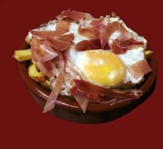Tapa De Huevos Estrellados Jamón Y Patatas Fritas