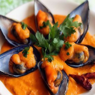 Ración De Mejillones En Salsa