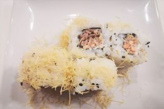 94. Uramaki Salmon Cotto  