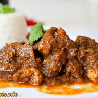 Arroz blanco Chivo Guisado