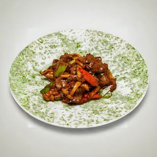 #46 Dados de solomillo al aroma de boletos con saté