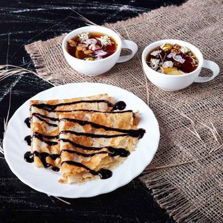 Boisson Chaude Et Crêpe Nutella