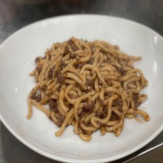 Strozzapreti con salsiccia e Sangiovese