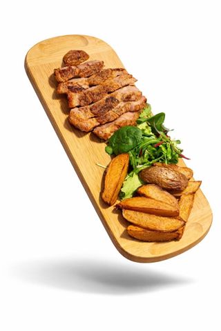 Стейк зі свинини з соусом BBQ