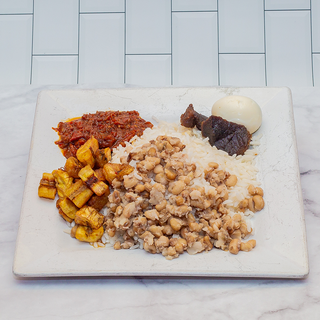 White rice mixed with beans+2beef+egg+plantain