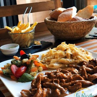 Émincé de poulet sauce champignon