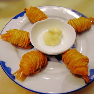 Gamberetti avvolti nelle patate 