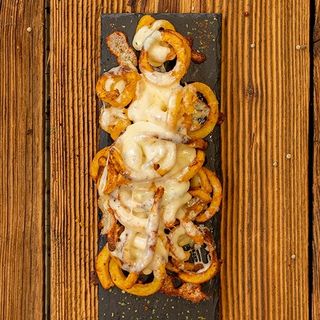 Frytki zakręcone  (250 g) zapiekane z serem