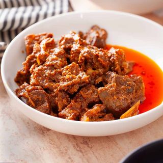 Bhunna Mutton Com arroz ou naan.