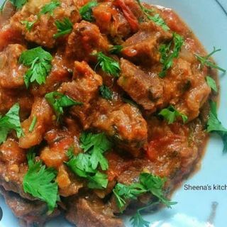 LAMB CURRY(Served with either chapati,rice,chips ugali)
