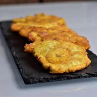 Porción de platano fritos