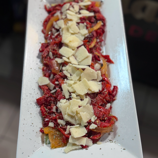 Pimientos asados al horno con lascas de parmesano 